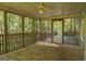Spacious screened porch overlooking wooded area at 5447 Centry Dr, Villa Rica, GA 30180