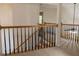 Upper level landing with staircase and railings at 5447 Centry Dr, Villa Rica, GA 30180