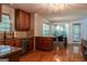 Eat-in kitchen with granite countertops and wooden cabinets at 5447 Centry Dr, Villa Rica, GA 30180