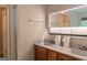 Main bathroom with double vanity and a large mirror at 5447 Centry Dr, Villa Rica, GA 30180