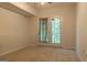 Finished basement room with carpet and french doors at 5447 Centry Dr, Villa Rica, GA 30180