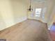 Formal dining room with carpeting, chair rail, and chandelier at 242 Old Fig Ln # 11, Fairburn, GA 30213