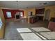 Kitchen and dining area with dark wood cabinets at 242 Old Fig Ln # 11, Fairburn, GA 30213