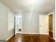 Bedroom with hardwood floors and access to bathroom at 1196 Burbank Trl, Morrow, GA 30260