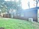 Brick house exterior with a backyard and patio at 1196 Burbank Trl, Morrow, GA 30260