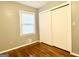 Bright bedroom with hardwood floors and closet at 1196 Burbank Trl, Morrow, GA 30260