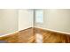 Spacious bedroom with hardwood floors and double door closet at 1196 Burbank Trl, Morrow, GA 30260