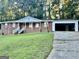 Brick ranch home with attached garage at 1196 Burbank Trl, Morrow, GA 30260