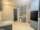 View of kitchen with granite countertops and gray cabinets at 1196 Burbank Trl, Morrow, GA 30260