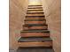 Wooden staircase leading to the upper level of the home at 225 Euharlee Five Forks Rd, Kingston, GA 30145