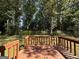 Wooden deck overlooking a wooded backyard at 3869 Rosedale Ln, Douglasville, GA 30135