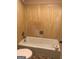 Bathtub and tiled shower in this full bathroom at 5914 Sutcliff Sq, Lithonia, GA 30058
