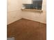 Small dining area with brown carpet and a pass-through counter at 5914 Sutcliff Sq, Lithonia, GA 30058