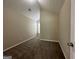 Bedroom with vaulted ceiling and carpet at 9585 Lakeview Cir, Union City, GA 30291