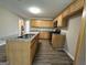 Spacious kitchen with an island and granite countertops at 9585 Lakeview Cir, Union City, GA 30291