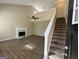 Living Room with high ceiling, fireplace, and loft at 9585 Lakeview Cir, Union City, GA 30291