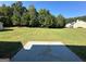 Large backyard with a patio at 9585 Lakeview Cir, Union City, GA 30291