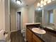 Bathroom with a sink, toilet, and shower at 9585 Lakeview Cir, Union City, GA 30291