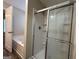 Bathroom with shower/tub combo, and updated vanity at 9585 Lakeview Cir, Union City, GA 30291