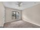 Spacious bedroom with plush carpeting and a large window at 3614 Whitfield Way, Powder Springs, GA 30127