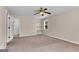 Large bedroom with ceiling fan, built-in shelves and carpeting at 3614 Whitfield Way, Powder Springs, GA 30127