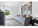 Bedroom with daybed, framed artwork and window at 1923 School House Ln, Temple, GA 30179