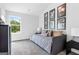 Guest bedroom with daybed and wall art at 1925 School House Ln, Temple, GA 30179
