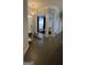 Bright and spacious entryway with high ceilings and columns at 938 Mulberry Fields Cv, Auburn, GA 30011