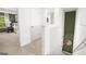 Upper hallway with bedroom access and a green accent wall at 544 Whitman (Lot 12) Ln # 2012, Stockbridge, GA 30281