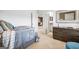 Bedroom with twin bed, dresser, and access to another room at 544 Whitman (Lot 12) Ln # 2012, Stockbridge, GA 30281