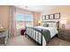 Bedroom with a king bed, neutral color scheme, and window with blinds at 544 Whitman (Lot 12) Ln # 2012, Stockbridge, GA 30281
