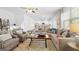 Open concept living room, showcasing kitchen and cozy seating at 544 Whitman (Lot 12) Ln # 2012, Stockbridge, GA 30281