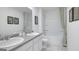 Bathroom with double vanity, tub shower combo, and grey tile floor at 544 Whitman (Lot 12) Ln # 2012, Stockbridge, GA 30281