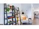 Cozy reading nook with comfortable armchair and stylish shelving at 544 Whitman (Lot 12) Ln # 2012, Stockbridge, GA 30281