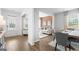 Open concept dining area and living room with hardwood floors at 544 Whitman (Lot 12) Ln # 2012, Stockbridge, GA 30281
