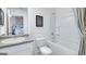 Bathroom with a single vanity, tub shower combo, and view of bedroom at 544 Whitman (Lot 12) Ln # 2012, Stockbridge, GA 30281