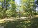 Circular play area with a rustic merry-go-round at 402 Thurman Rd, Stockbridge, GA 30281
