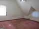 Small bedroom with pink carpet and two windows at 402 Thurman Rd, Stockbridge, GA 30281