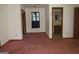 Bedroom with carpet, window, and adjacent bathroom at 402 Thurman Rd, Stockbridge, GA 30281