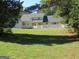 Back of house showing a deck and fenced-in pool area at 402 Thurman Rd, Stockbridge, GA 30281