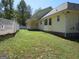 Yellow sided home with large backyard at 402 Thurman Rd, Stockbridge, GA 30281