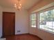 Bright dining room featuring a chandelier and bay window at 402 Thurman Rd, Stockbridge, GA 30281