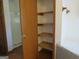 Convenient linen closet with wooden shelves at 402 Thurman Rd, Stockbridge, GA 30281