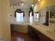 Spacious bathroom with double vanity, jacuzzi tub, and separate shower at 402 Thurman Rd, Stockbridge, GA 30281