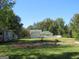 Large backyard with an RV and a cleared area at 402 Thurman Rd, Stockbridge, GA 30281