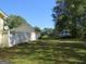 Spacious side yard with a white fence and RV parking at 402 Thurman Rd, Stockbridge, GA 30281