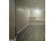 Large basement room with laminate flooring at 508 Wynbrooke Pkwy, Stone Mountain, GA 30087