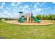 Community playground with swings and slides at 7216 Tolar Rd # 9, South Fulton, GA 30213