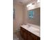 Bathroom with double sinks and a large mirror at 3688 Eagles Beek Cir, Lithonia, GA 30038