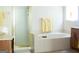 Bathroom with soaking tub and separate shower at 3688 Eagles Beek Cir, Lithonia, GA 30038